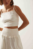 Cropped alça torcida tapioca